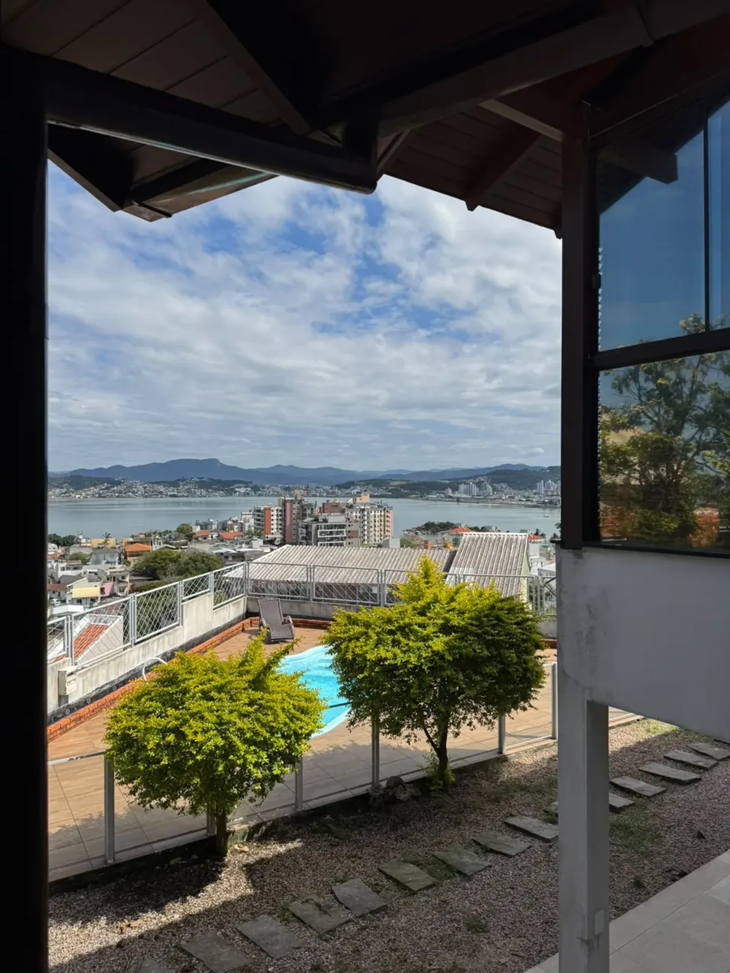 620 m² house with a glass-enclosed balcony and a water view — photo 18