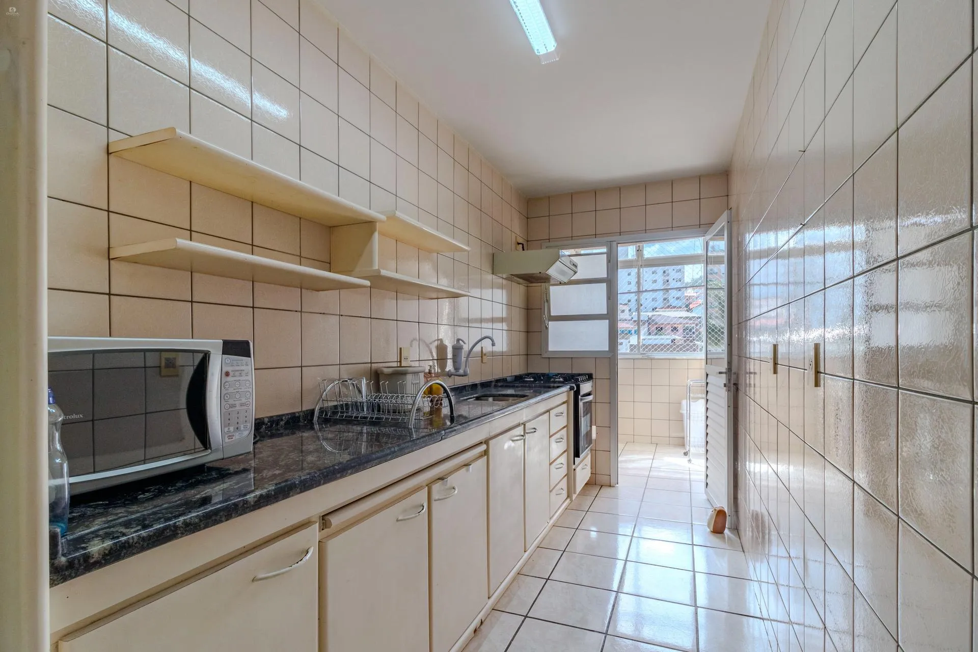 Balcony with a grill in a 2-bedroom apartment, 60 m² — photo 15