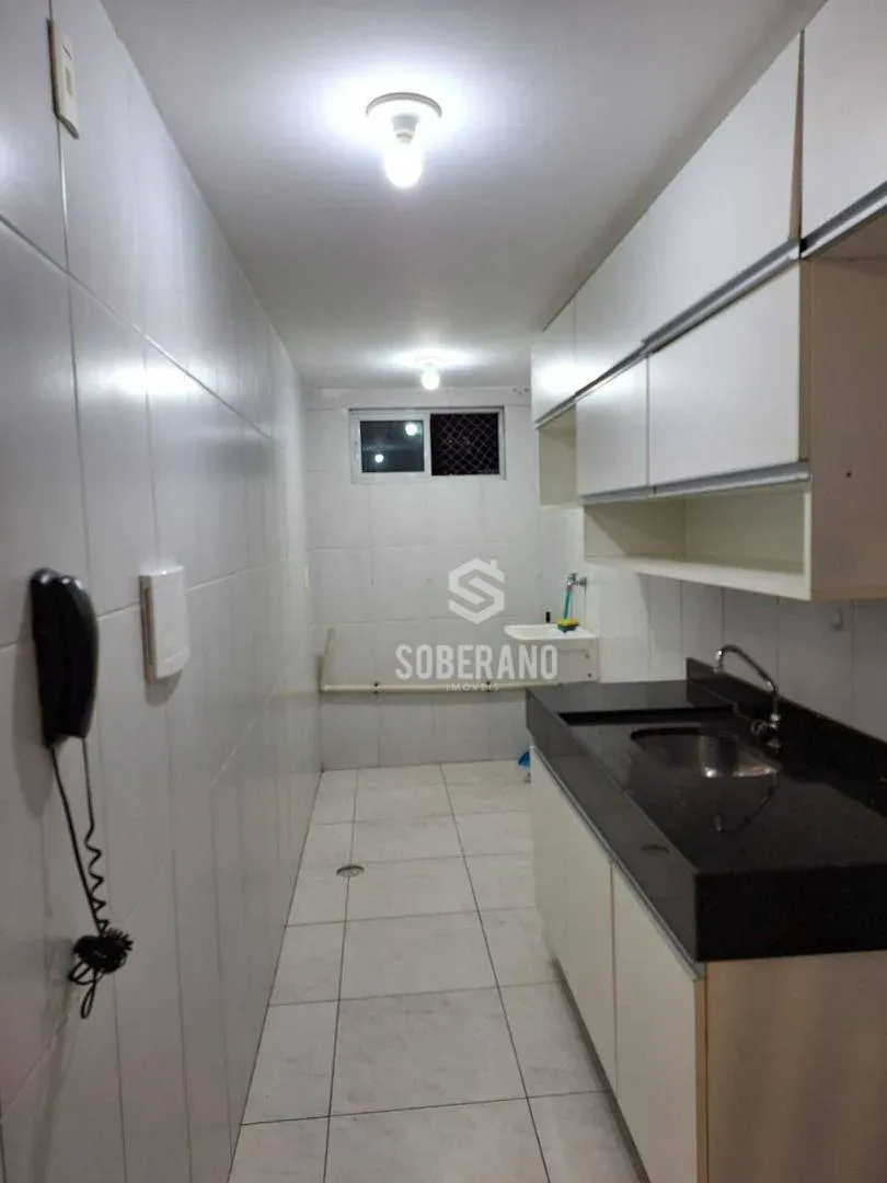 Apartamento de 58 m² com 2 quartos e cozinha separada