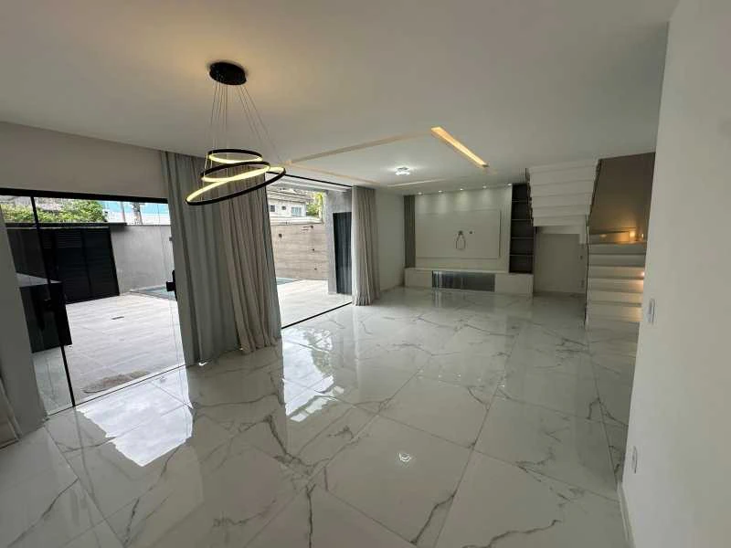 Casa com 4 suítes e 292 m², com 3 vagas e churrasqueira — photo 21
