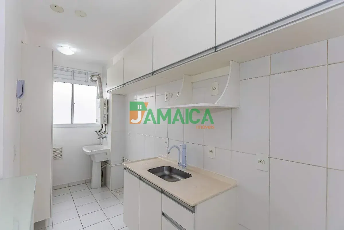 2-bedroom apartment in a building with a pool — photo 2