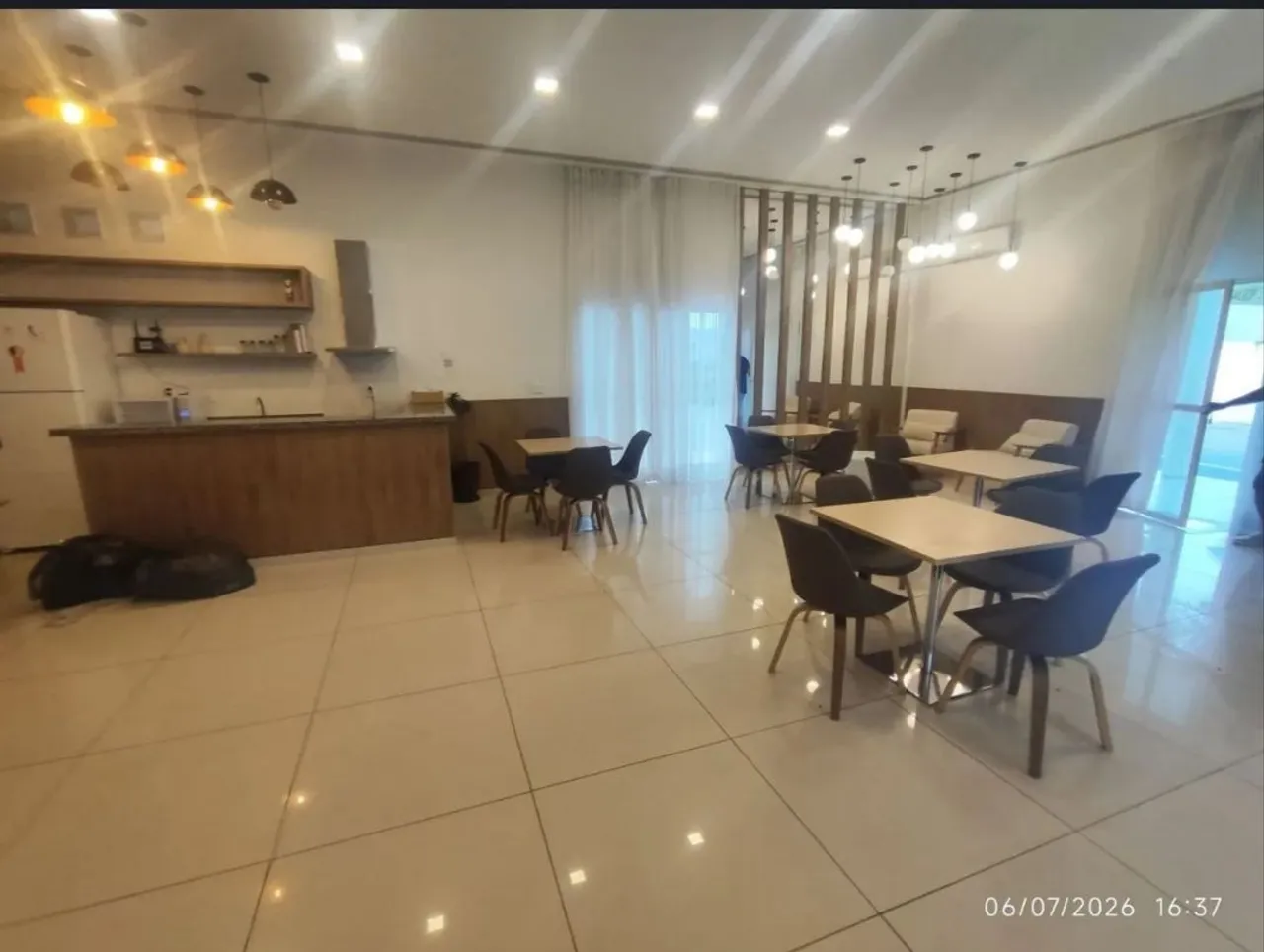 2-bedroom apartment in a building with a pool — photo 3