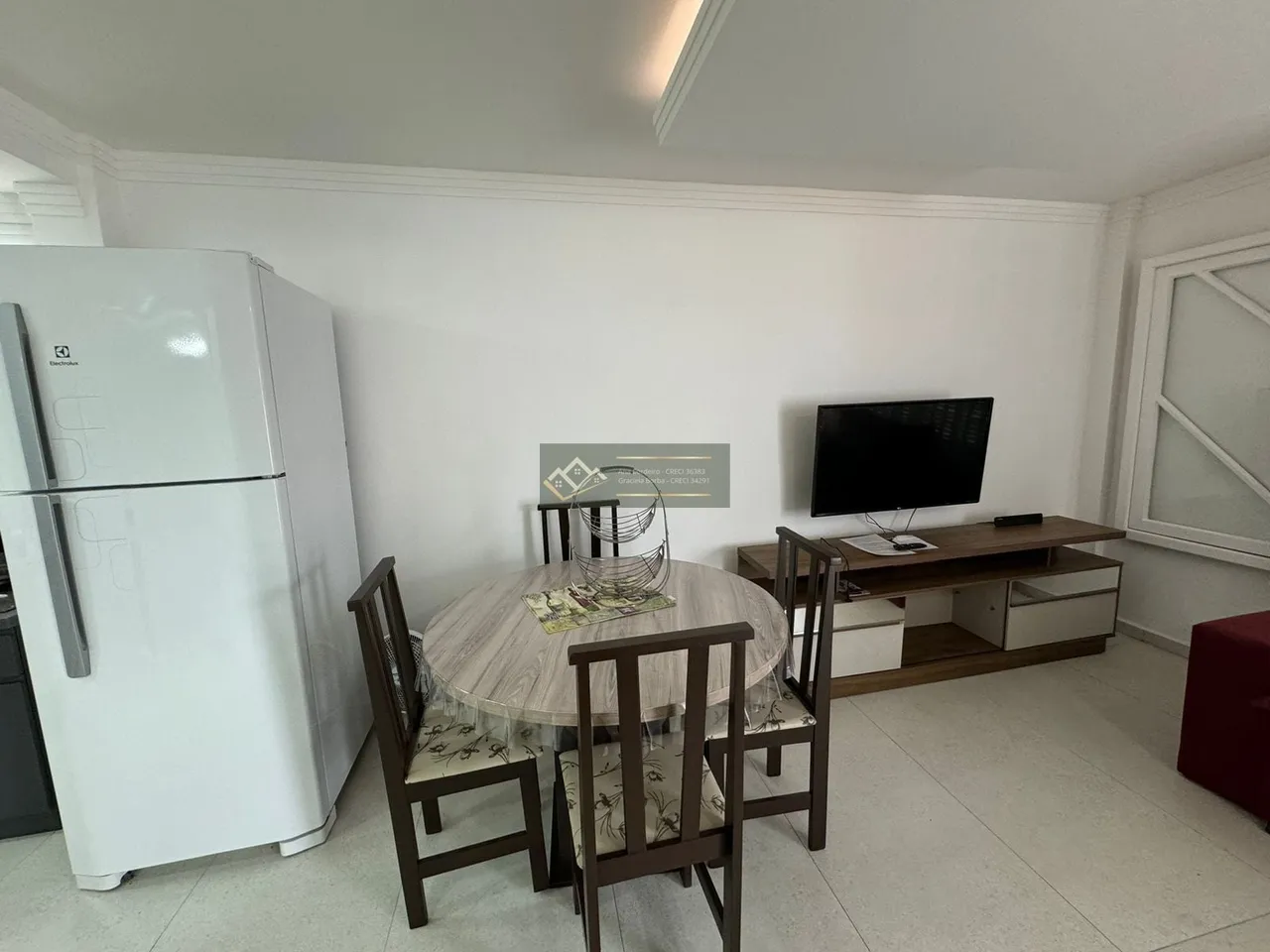 2-bedroom apartment in a building with a pool — photo 3