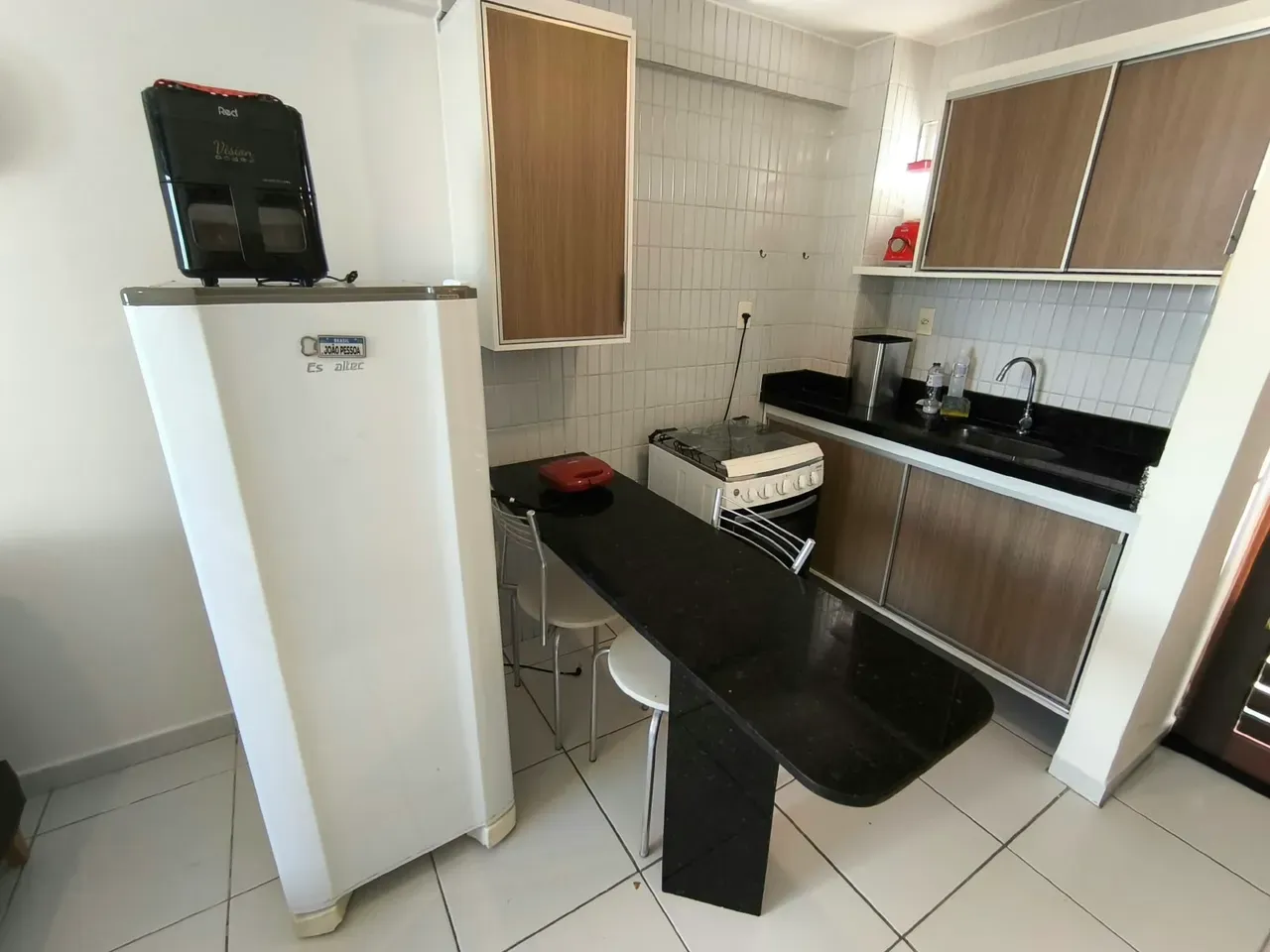One-bedroom apartment in a building with a pool — photo 2