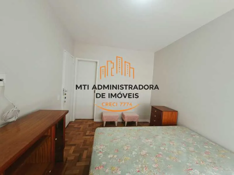 2-bedroom apartment in a building with a pool — photo 13