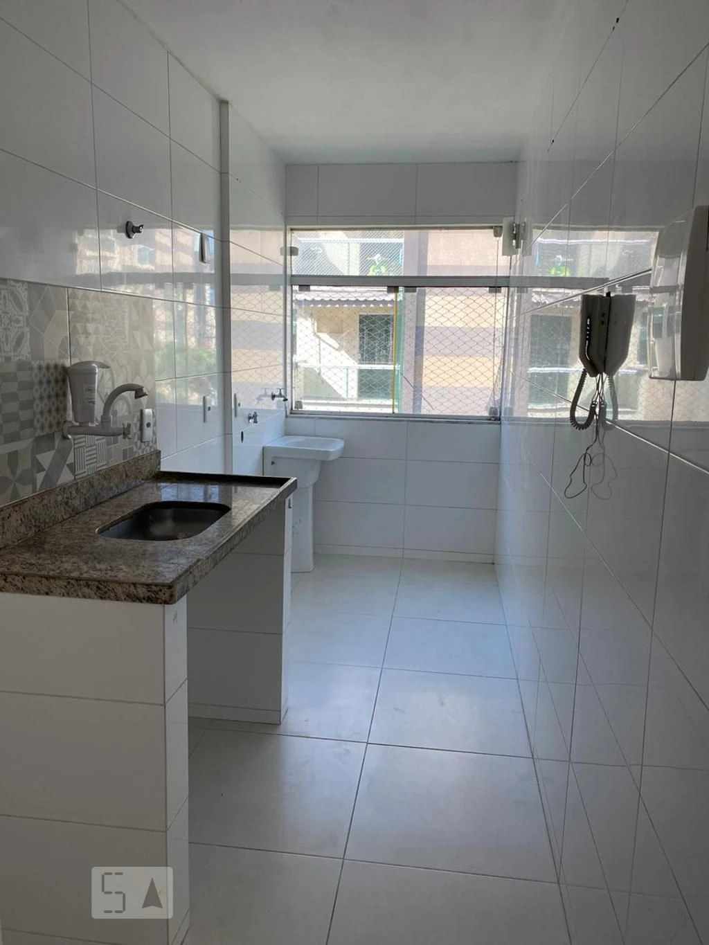 2-bedroom apartment in a building with a pool — photo 2