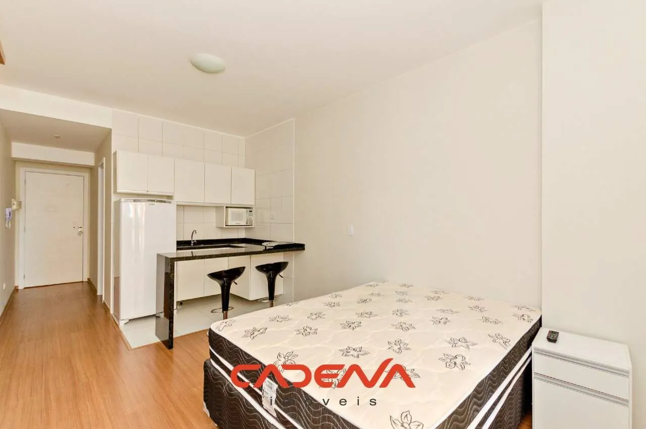 42 m² unfurnished studio with open kitchen and wood floors — photo 2