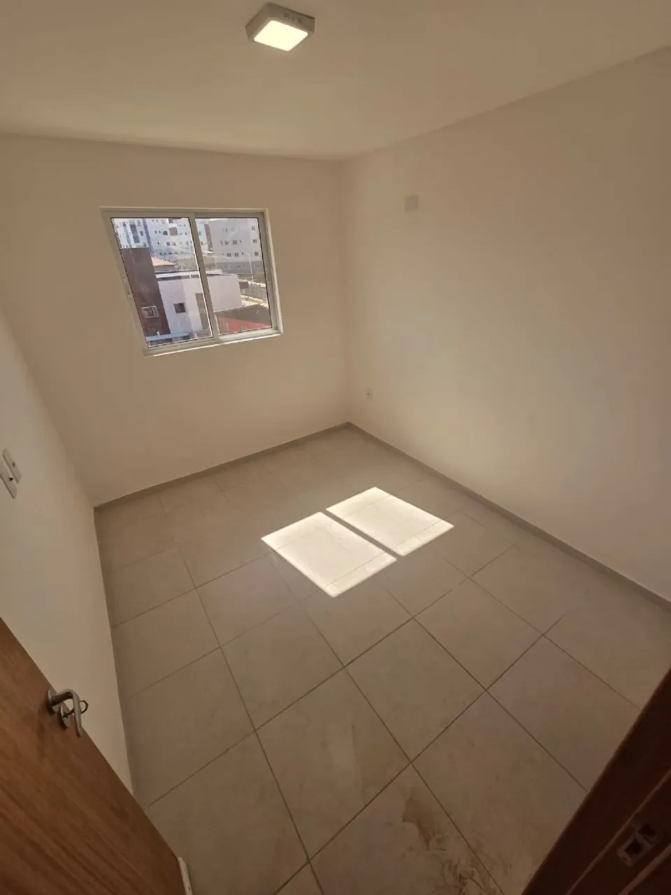 2-bedroom apartment in a building with a pool — photo 7