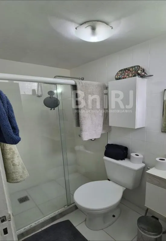 2-bedroom apartment in a building with a pool — photo 15