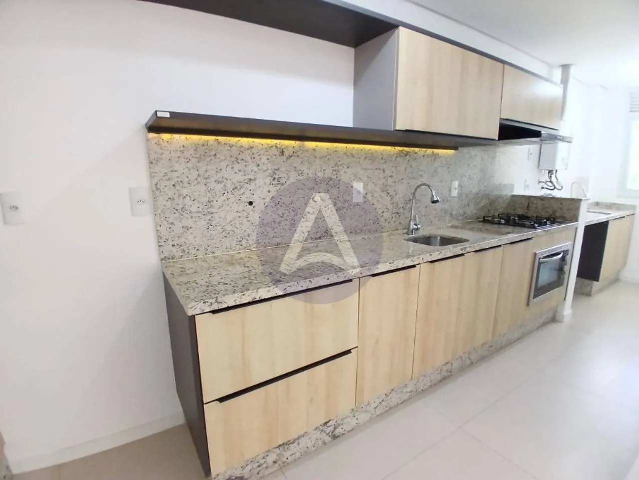 2-bedroom apartment in a building with a pool — photo 2