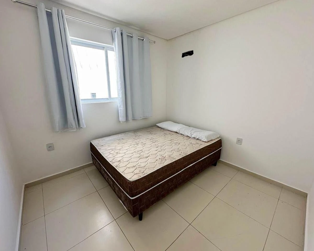 2-bedroom apartment in a building with a pool — photo 13