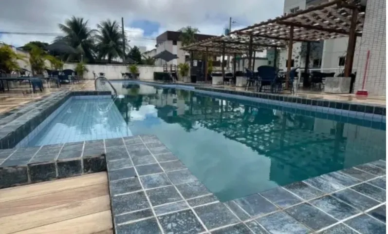 2-bedroom apartment in a building with a pool — photo 3