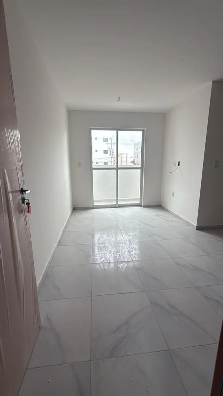 2-bedroom apartment in a building with a pool