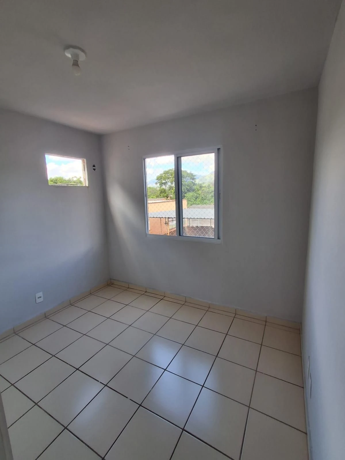 2-bedroom apartment in a building with a pool