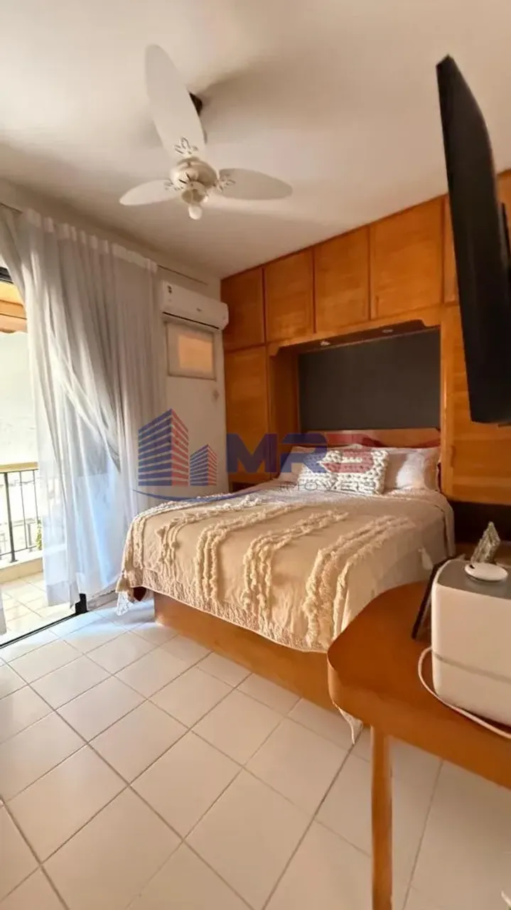 Balcony with a grill in a 2-bedroom apartment, 60 m² — photo 9