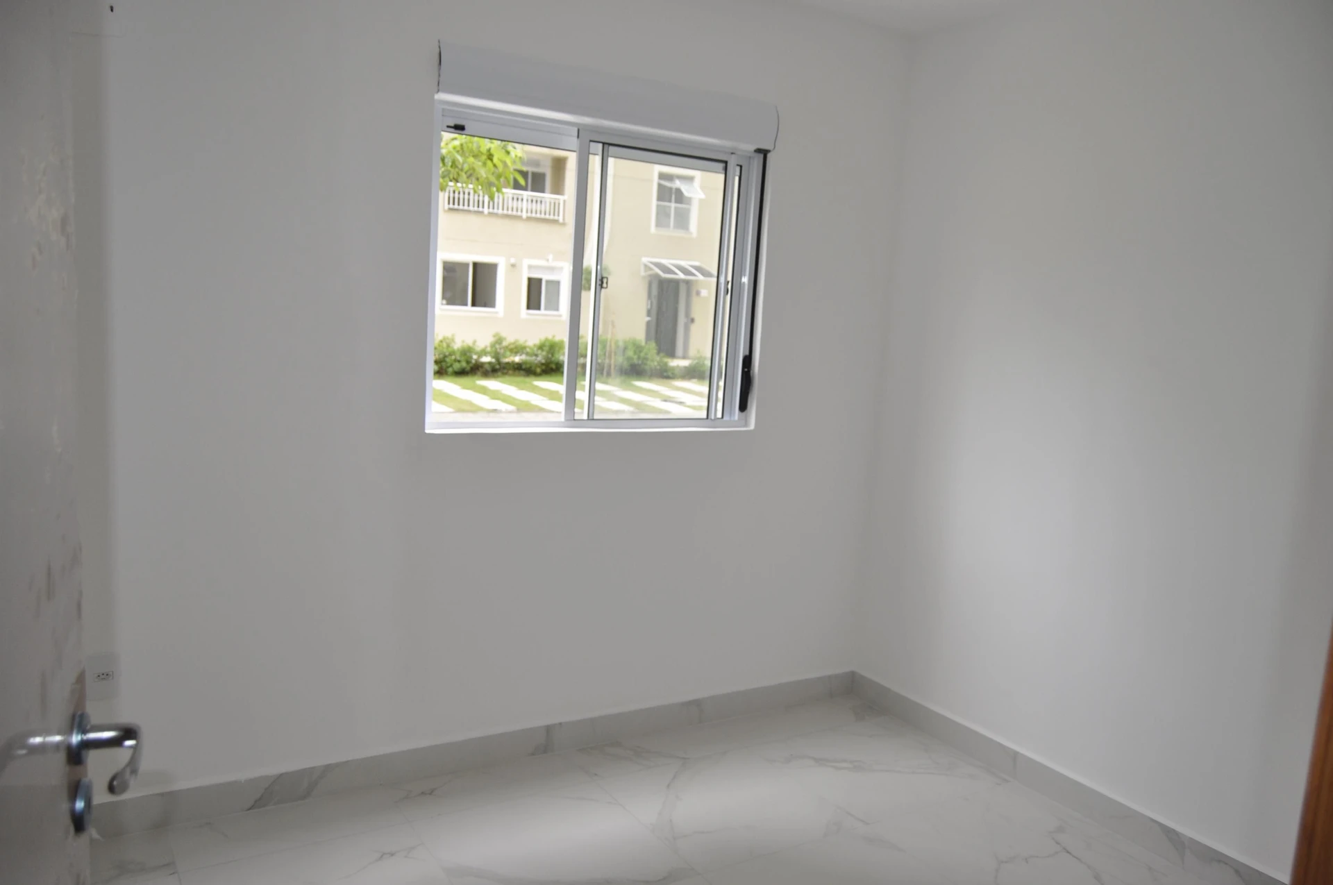 2-bedroom apartment in a building with a pool — photo 16