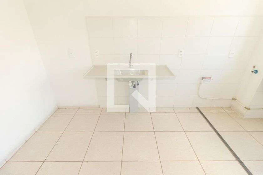 Minimal-style 2-bedroom apartment with ceramic floors — photo 19