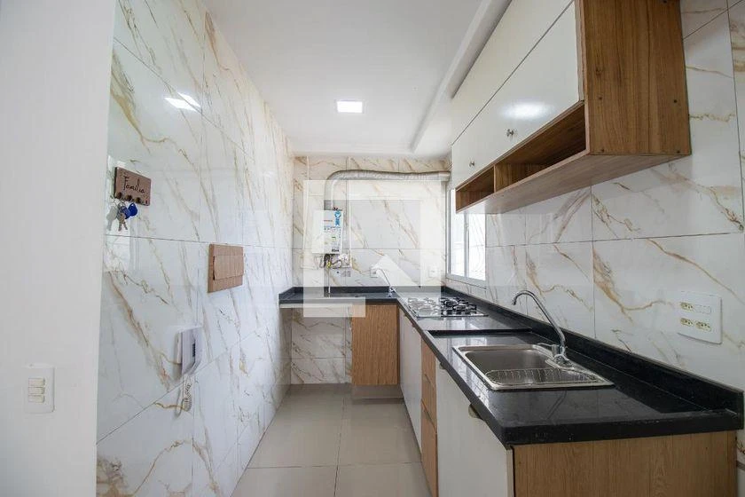 2-bedroom apartment in a building with a gym