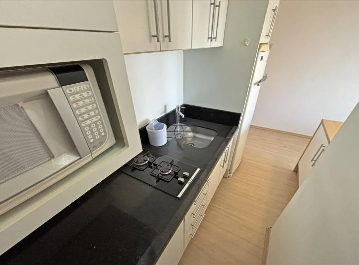 Apartamento de 1 quarto com cozinha integrada e 46 m² — photo 2