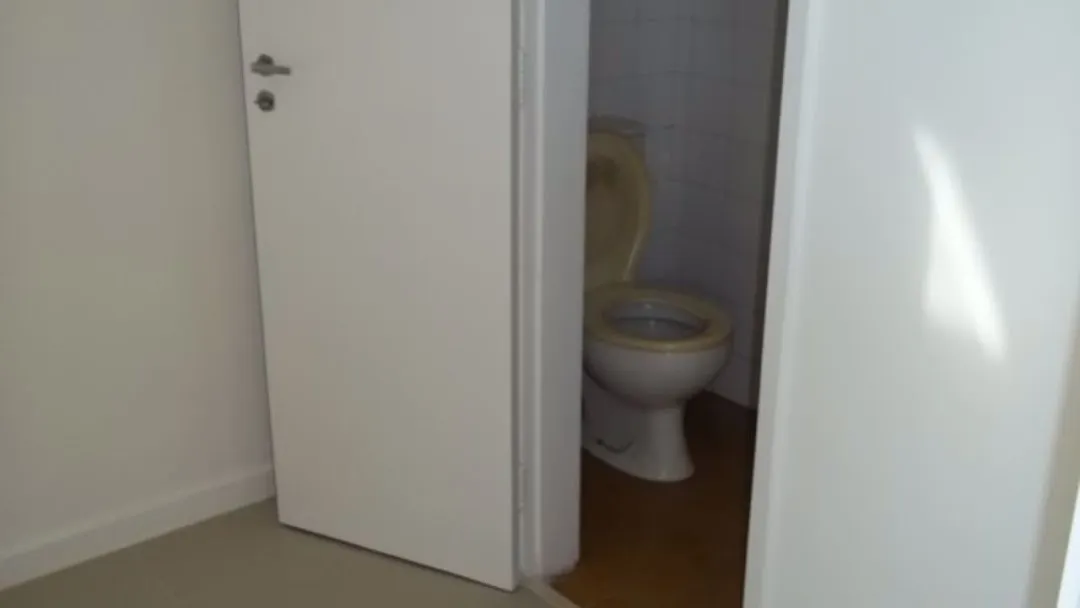 2-bedroom apartment in a building with a pool — photo 14