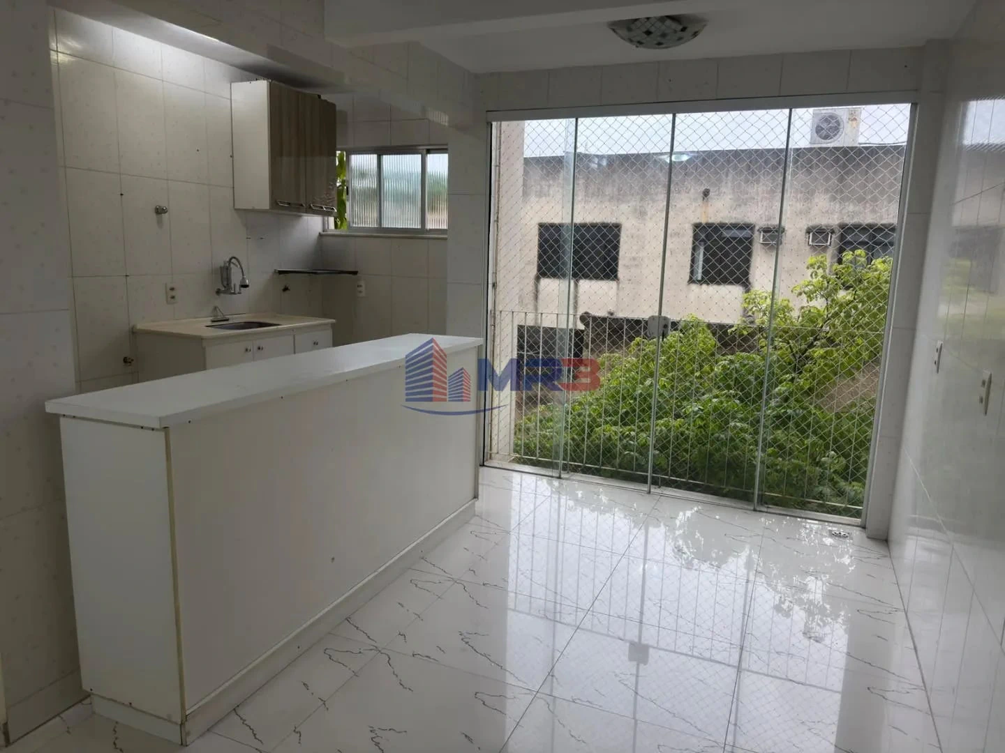 2-bedroom apartment in a building with a pool — photo 2