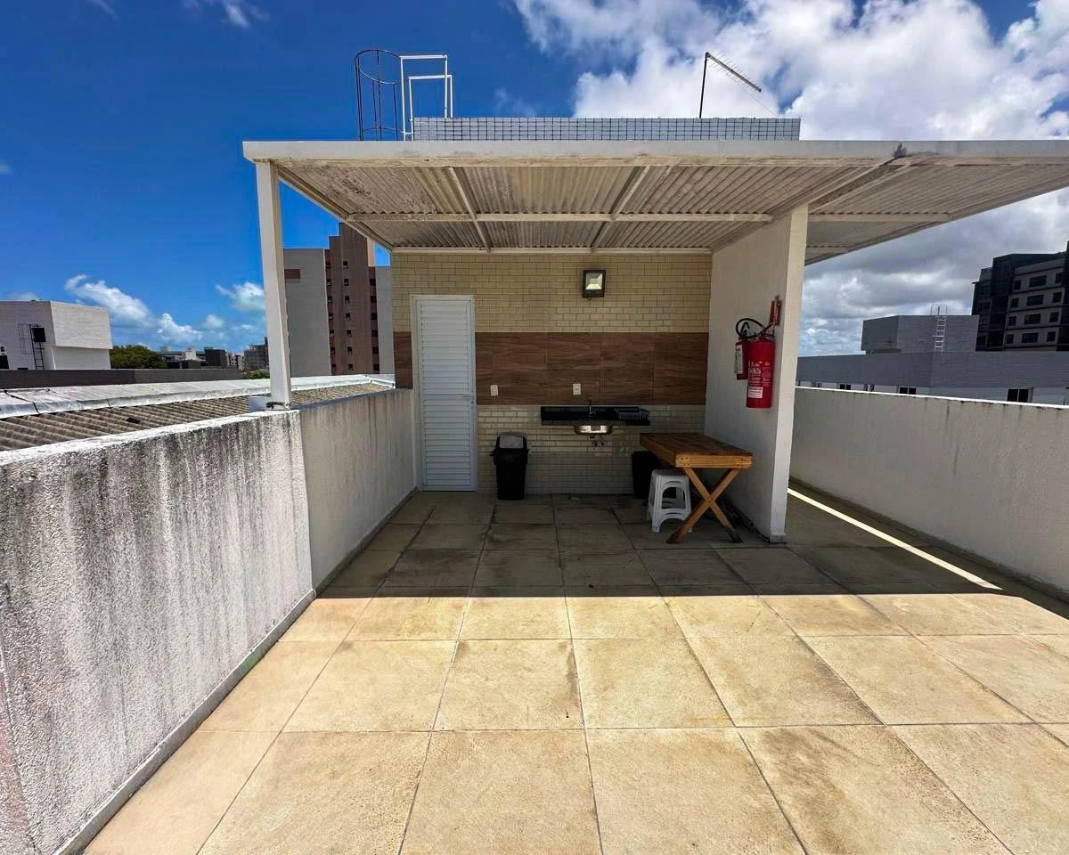 2-bedroom apartment in a building with a pool — photo 16