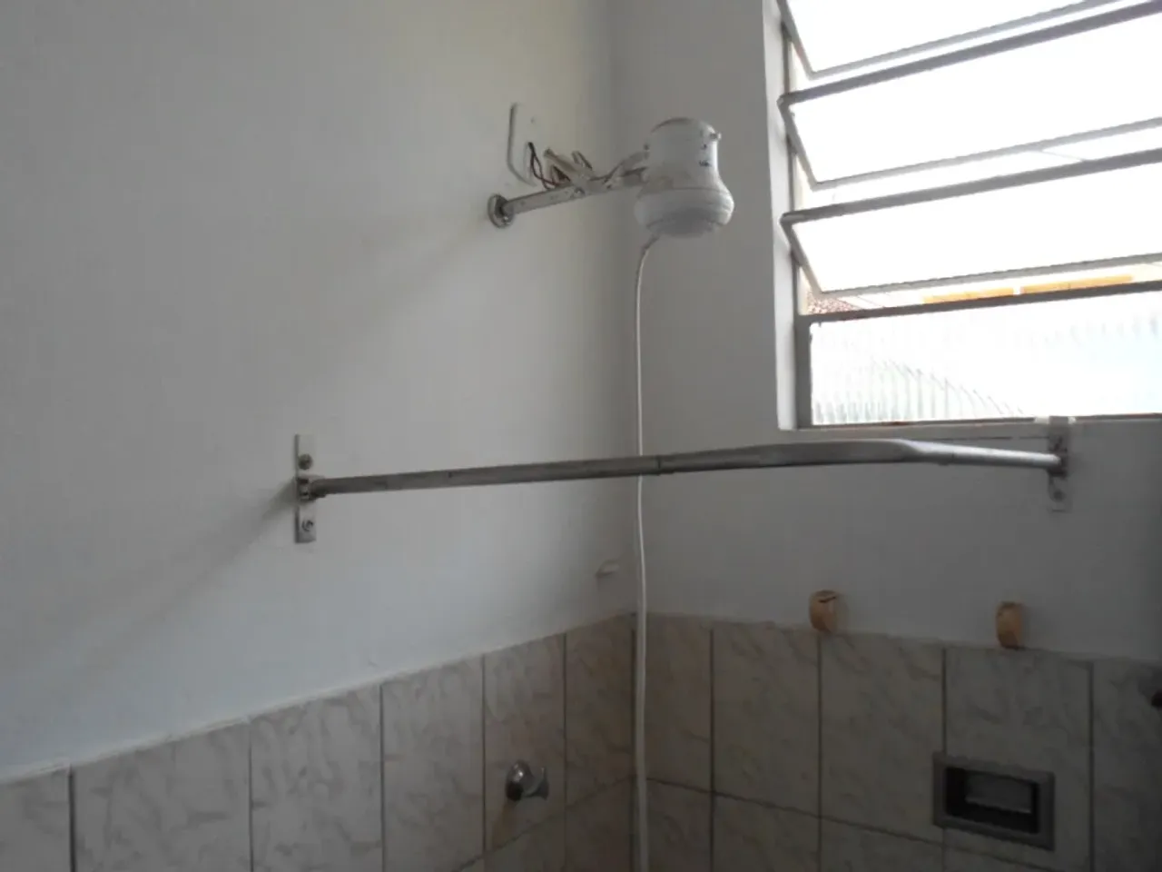 Apartamento conjugado de 27 m² com 1 quarto e cozinha compacta — photo 8