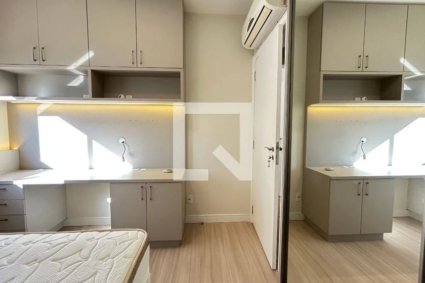 2-bedroom apartment in a building with a pool — photo 13