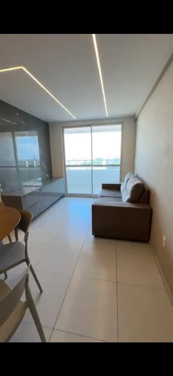 Furnished apartment with an open-plan kitchen and gas stove — photo 13