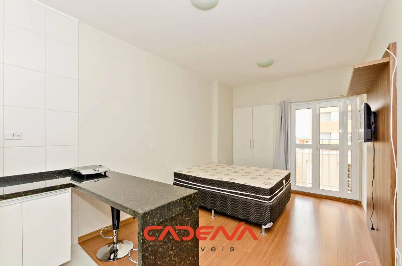 42 m² unfurnished studio with open kitchen and wood floors — photo 4