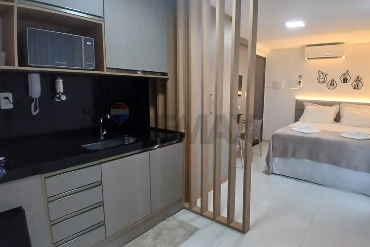 One-bedroom apartment in a building with a pool — photo 8