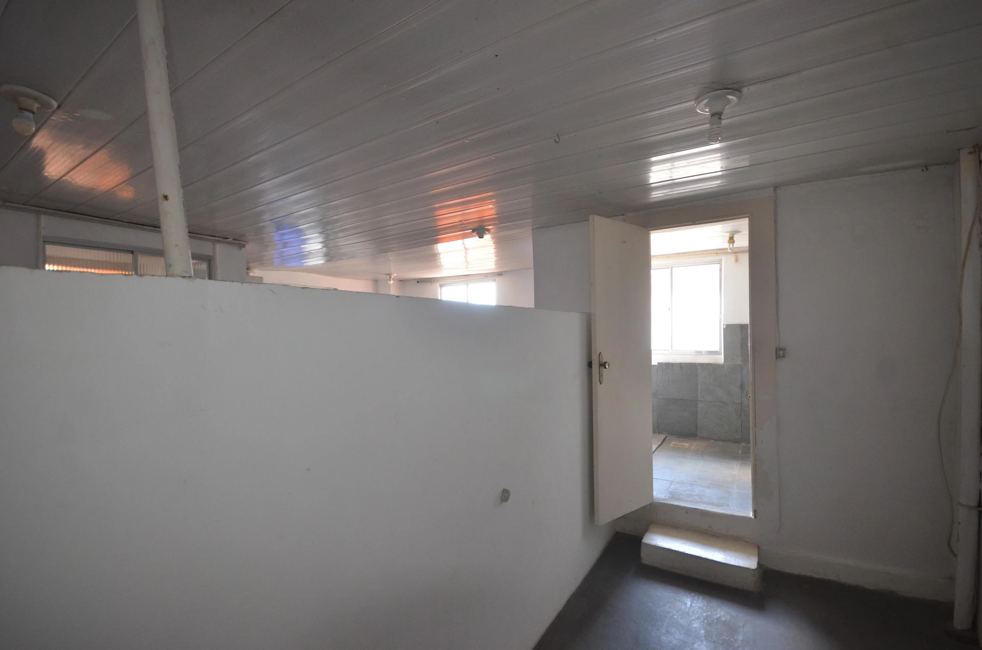 1-bedroom rental apartment with a compact kitchenette — photo 14