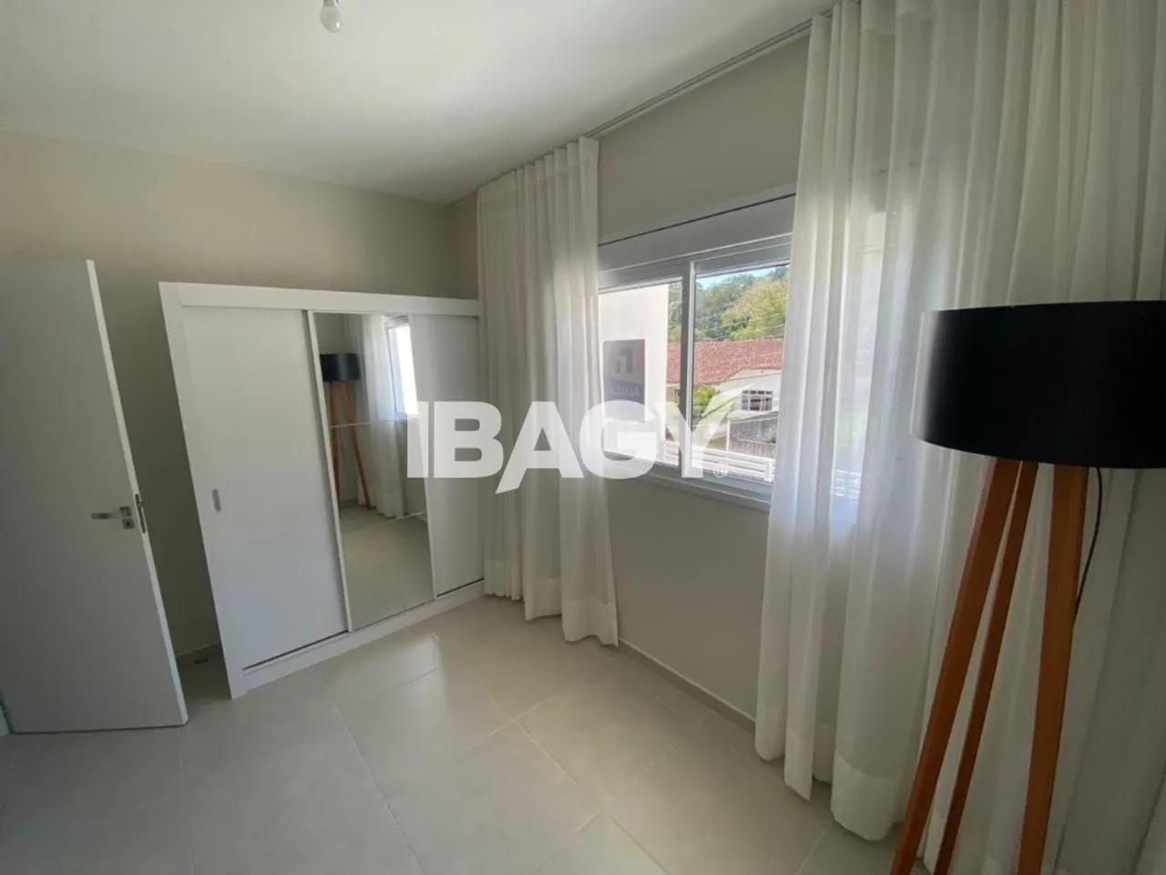 2-bedroom apartment in a building with a pool