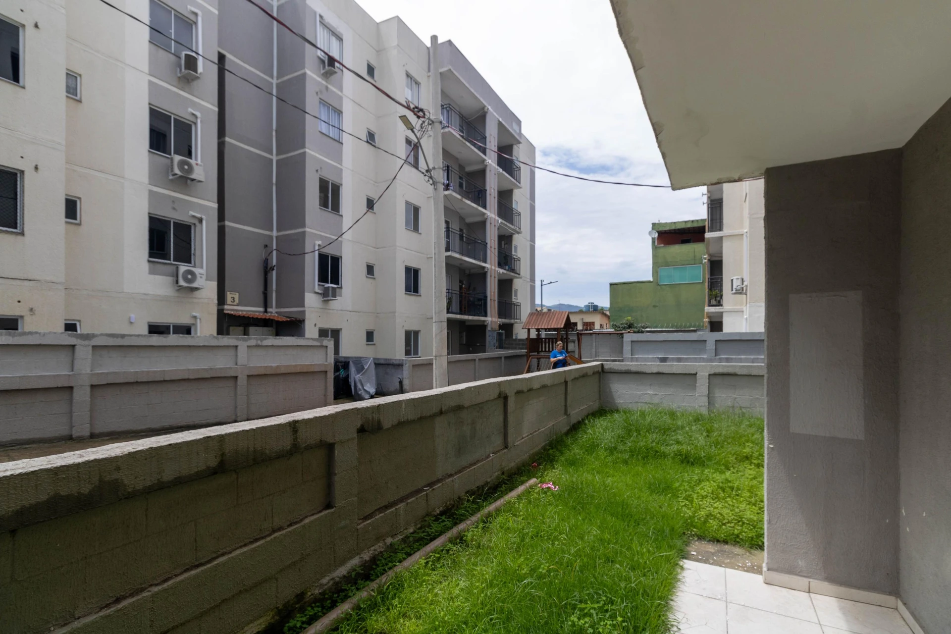 2-bedroom apartment in a building with a pool — photo 15