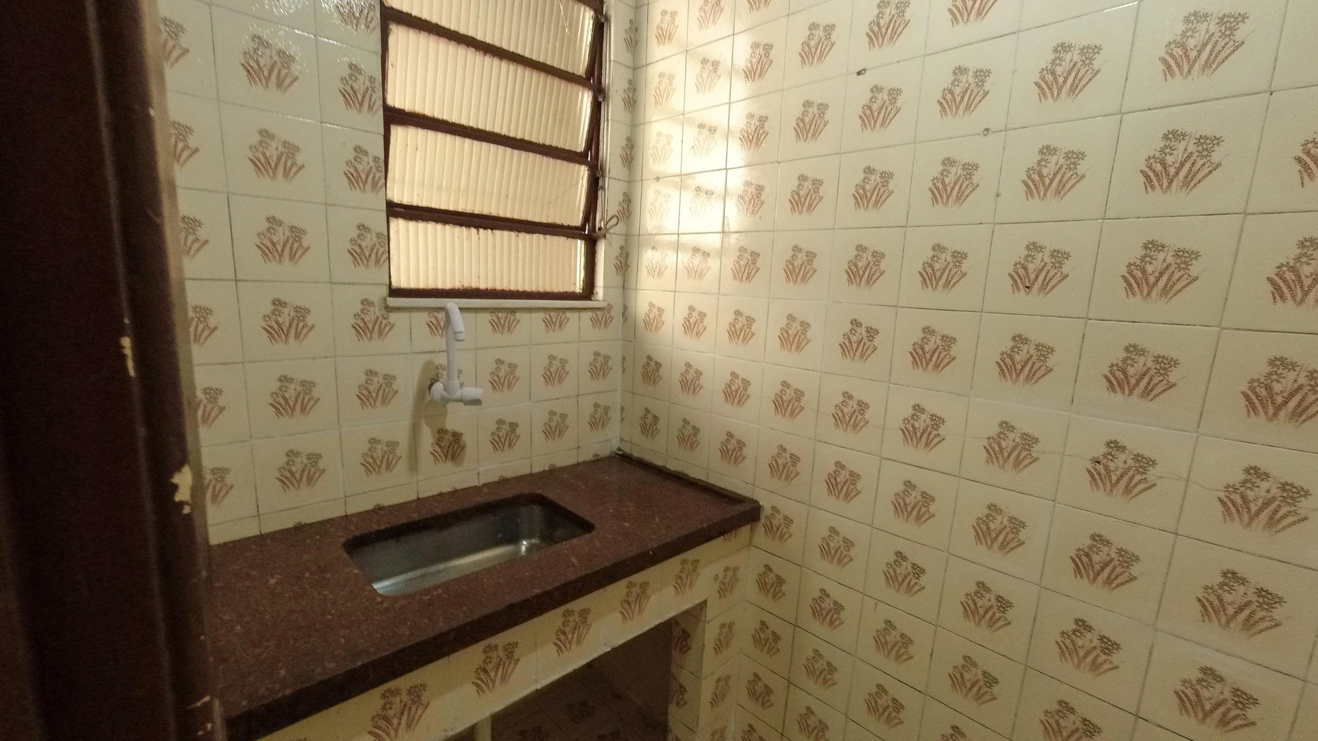Unfurnished house with a balcony and private garden