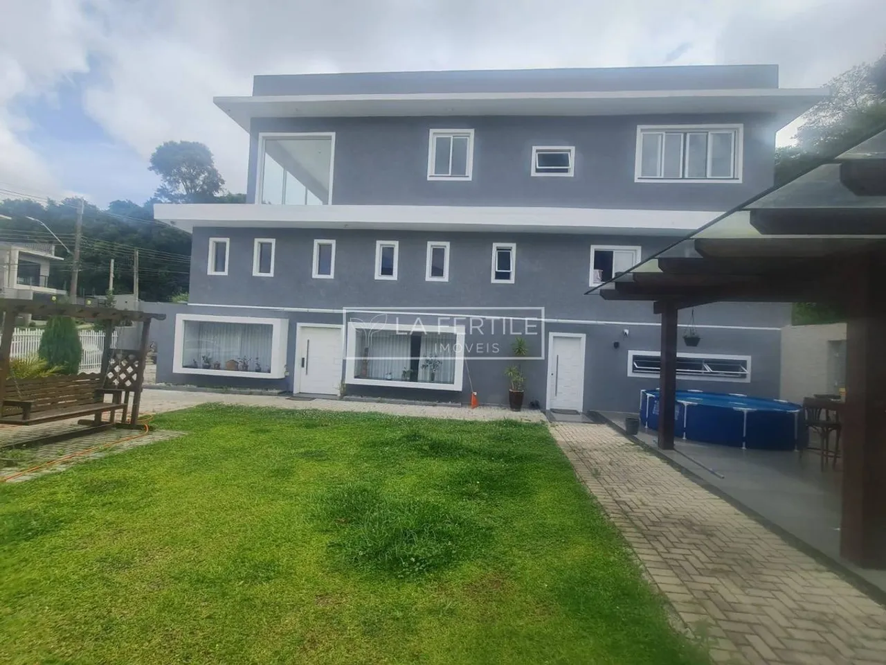 House with 3 bedrooms and floor-to-ceiling windows — photo 12