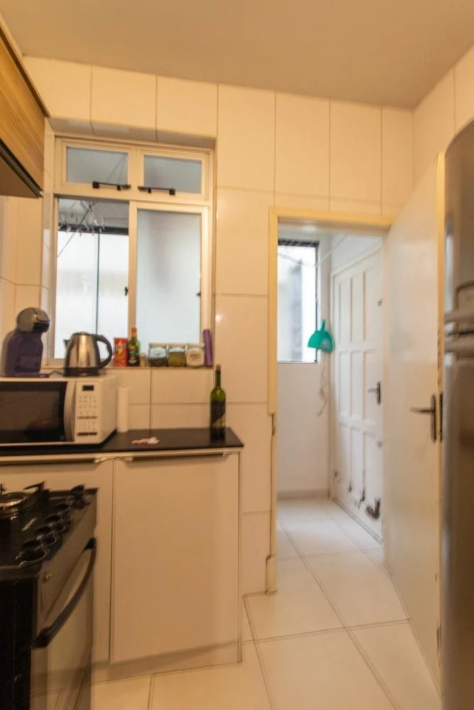 Furnished 2-bedroom apartment with desk workspace corner — photo 13