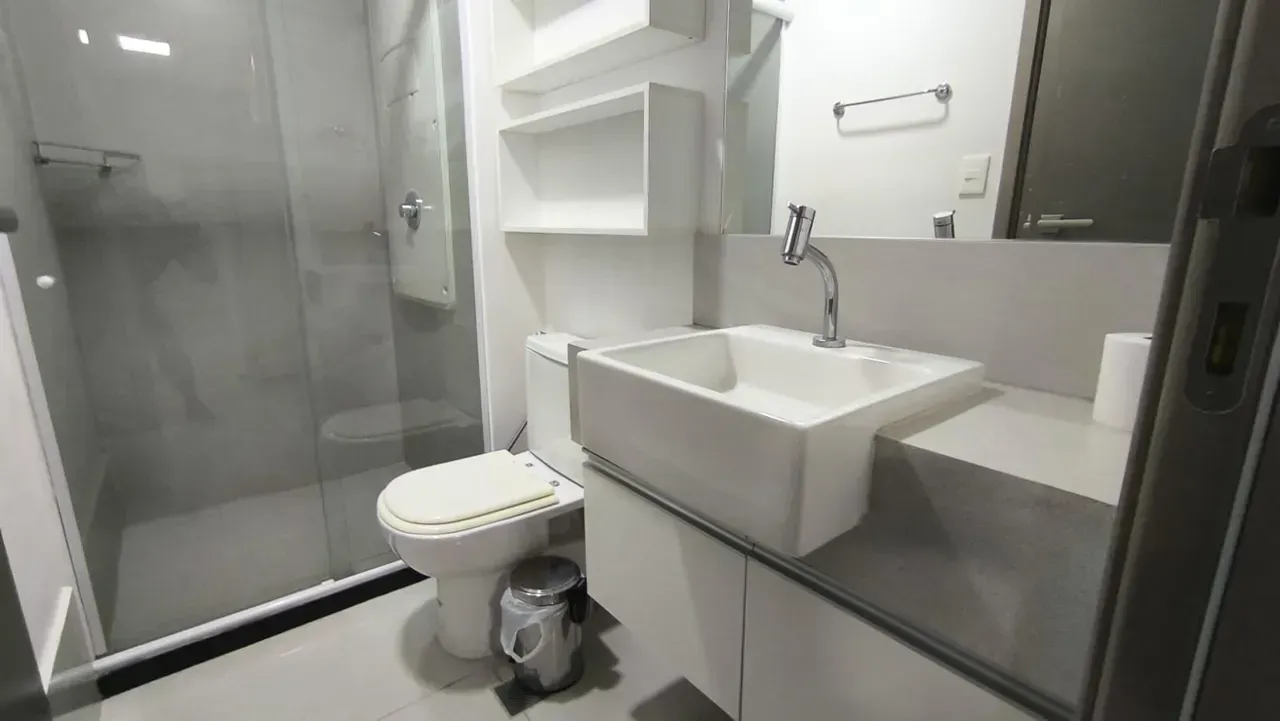 2-bedroom apartment in a building with a pool — photo 10