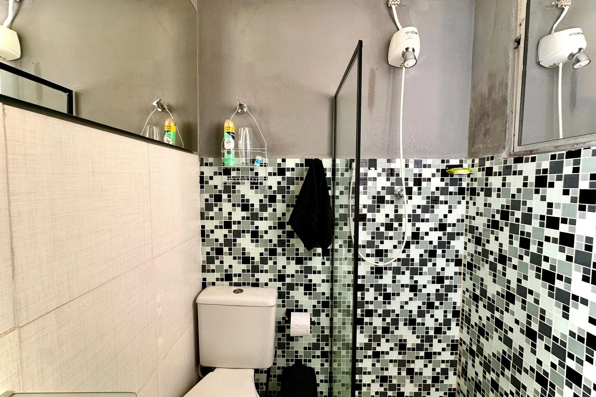 Furnished studio with 1 bedroom and a glass shower — photo 10