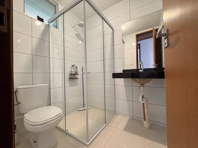 2-bedroom apartment in a building with a pool — photo 14