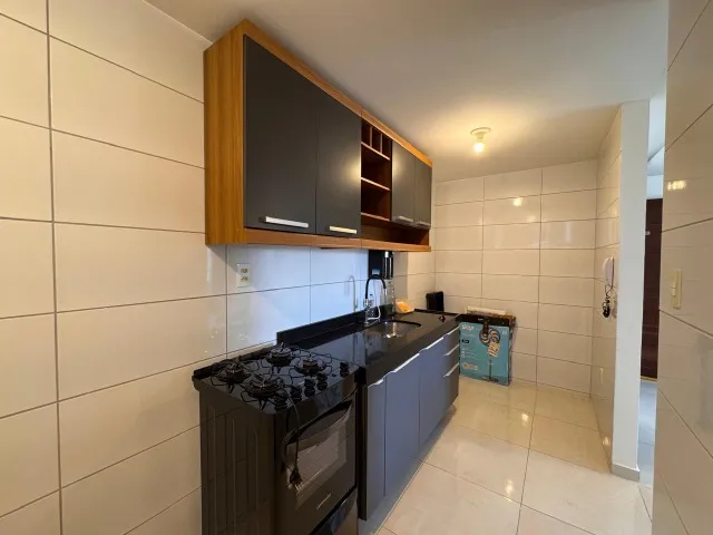 2-bedroom apartment in a building with a pool — photo 2