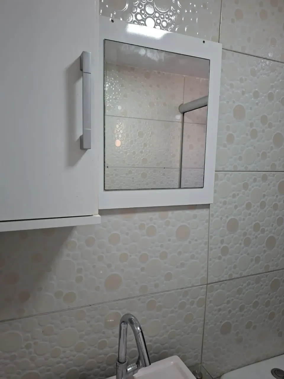 1-bedroom apartment with tiled floors and glass shower — photo 2