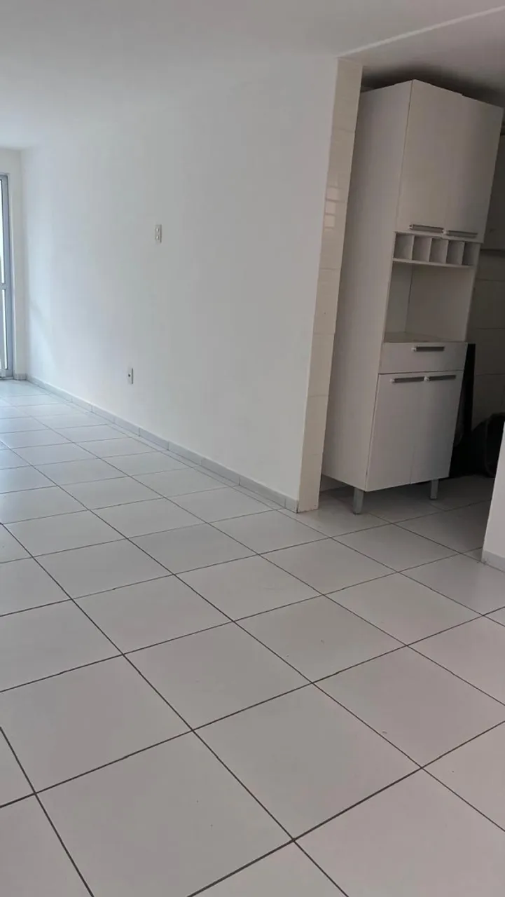 2-bedroom apartment in a building with a pool — photo 7