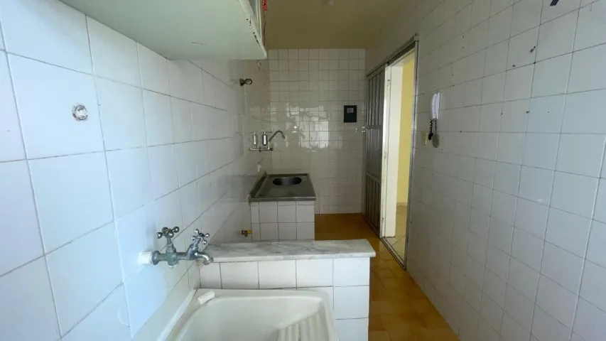 2-bedroom apartment in a building with a pool — photo 6