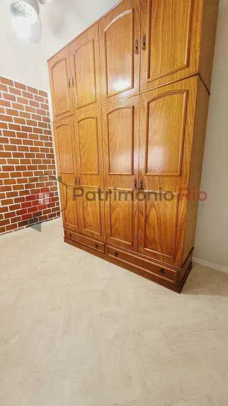 2-bedroom apartment in a building with a pool — photo 18