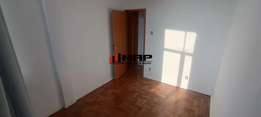 2-bedroom apartment with a compact kitchen and stove — photo 11