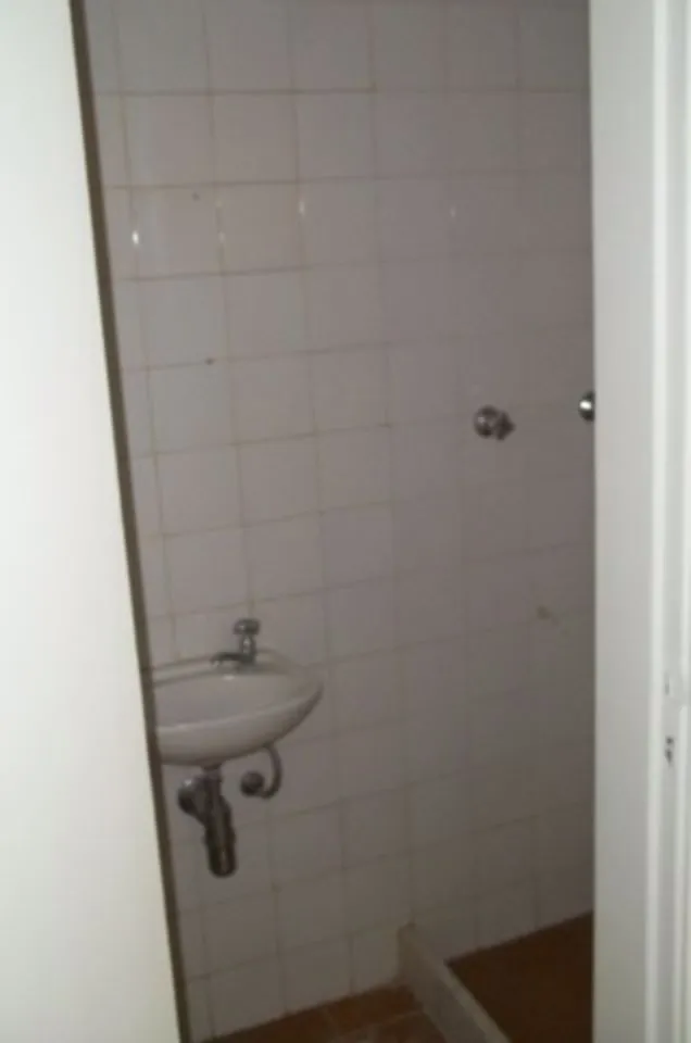 2-bedroom apartment in a building with a pool — photo 10