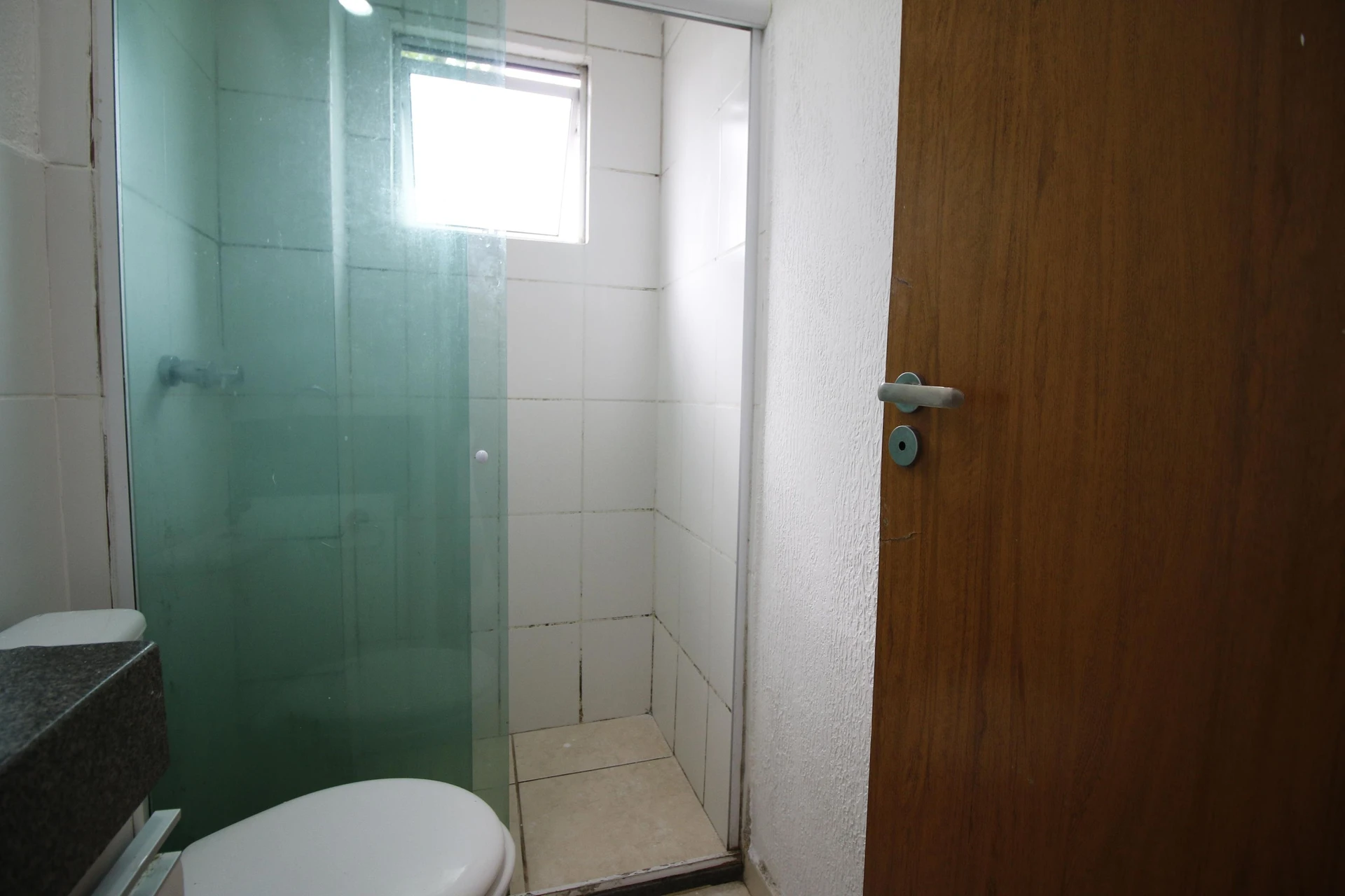 2-bedroom apartment in a building with a pool — photo 26
