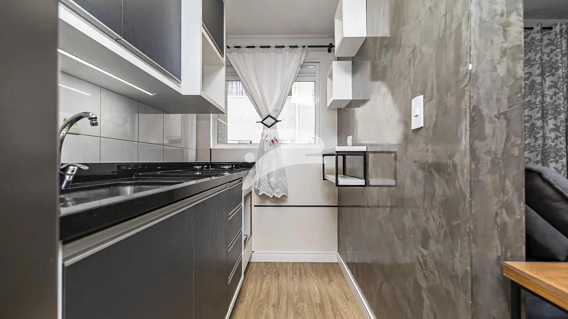 1-bedroom apartment with open-plan kitchen and electric stove — photo 2