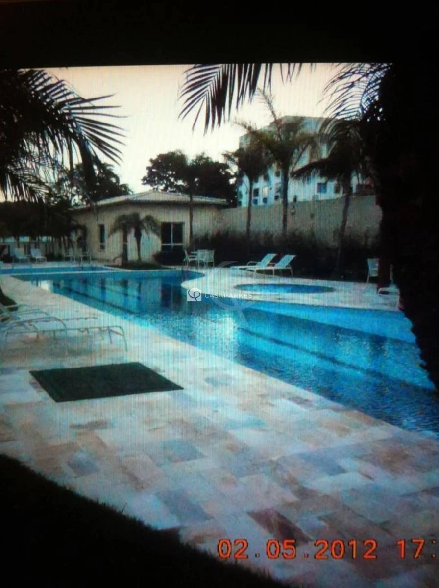 2-bedroom apartment in a building with a pool — photo 4